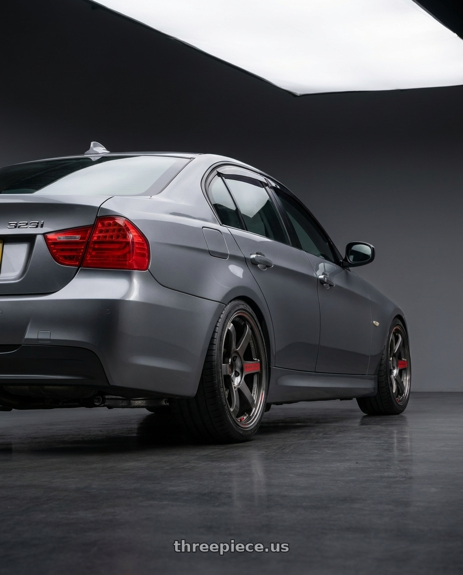 2009 e90 323i with Volk Racing TE37 Saga SL 5x120 18x9.0+23 Pressed Graphite wheels rear three quarter view square tires
