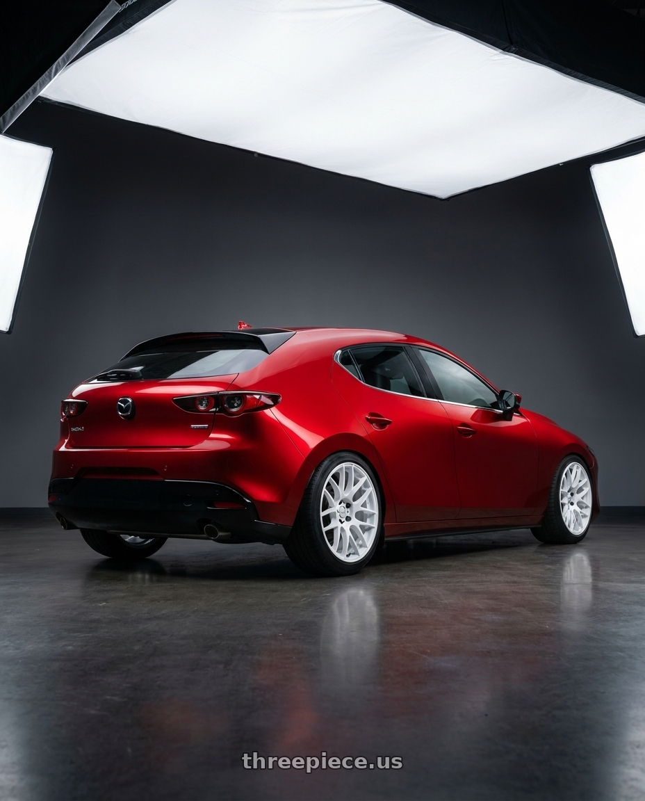 2024 Mazda 3 with Work Emotion m8r 5x100 19x8.5 +38 White wheels rear three quarter view square tires