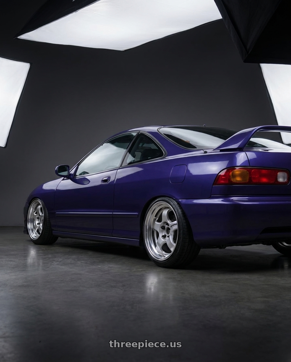 1998 acura integra with Work Meister S1 2P 4x100 15x10+22 O Disk Silver wheels rear three quarter view slight stretch tires