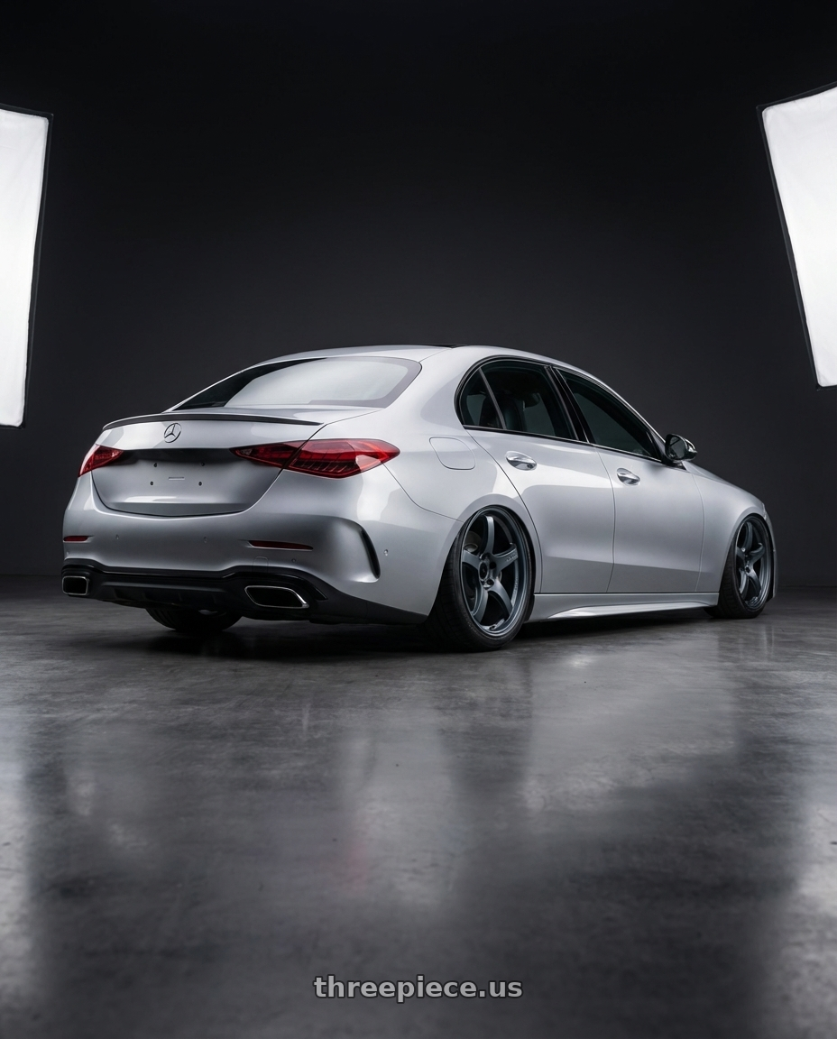 2022 Mercedes-Benz C-Class W206 with Gram Lights 57CR 5x112 19x8.5+45 Gunblue II wheels rear three quarter view slight stretch tires