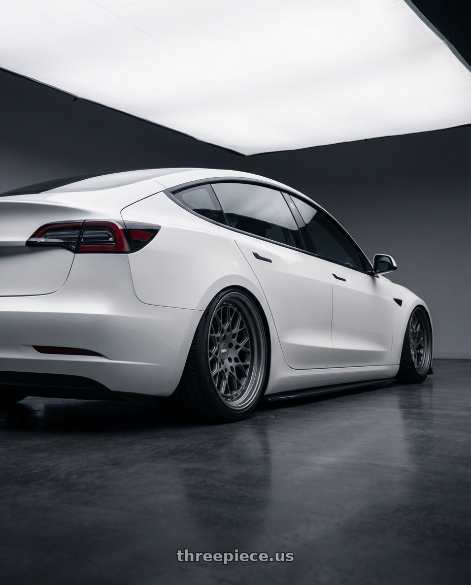 2023 Tesla Model 3 with ESR Wheels CS SERIES CS3 5x114.3 19x10.5 +22 Matte Graphite wheels rear three quarter view slight stretch tires