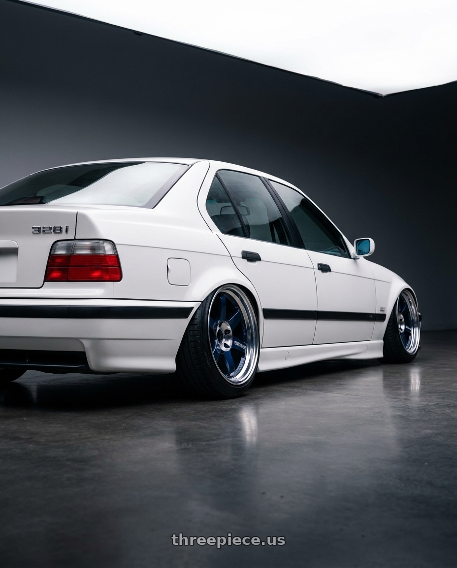 1998 bmw 328i with Volk Racing 21C 5x114.3 18x10.5 +15 MAG BLUE / RIM DC wheels rear three quarter view slight stretch tires