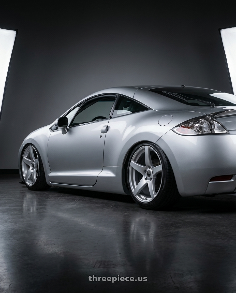 2010 Mitsubishi Eclipse with Forgestar CF5 5x114.3 19x9.5 +29 Gloss Silver wheels rear three quarter view slight stretch tires