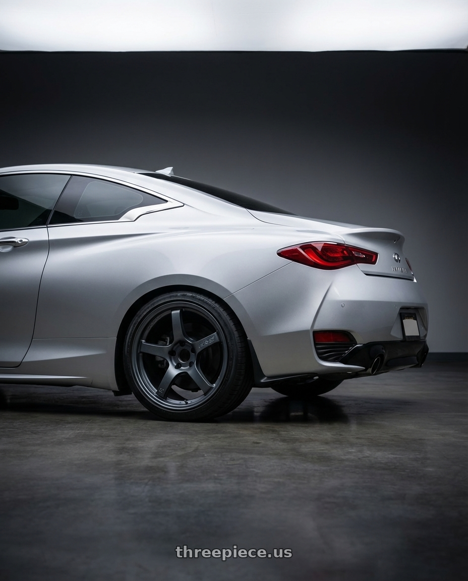 2020 Infiniti Q60 with Gram Lights 57CR 5x114.3 19x9.5+35 Gunblue II wheels rear three quarter view square tires