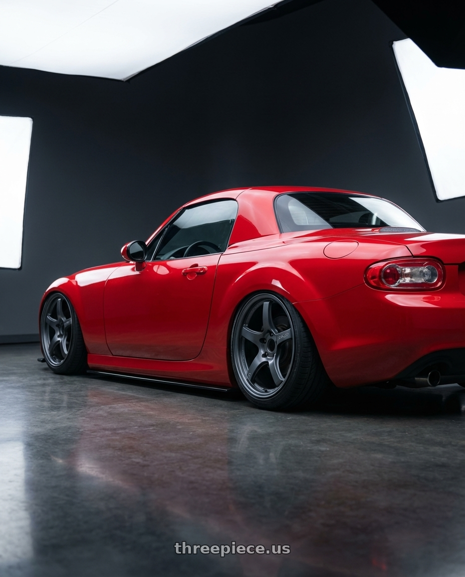 2012 Mazda MX-5 Miata NC with Gram Lights 57CR 5x114.3 17x9+22 Gunblue II wheels rear three quarter view slight stretch tires