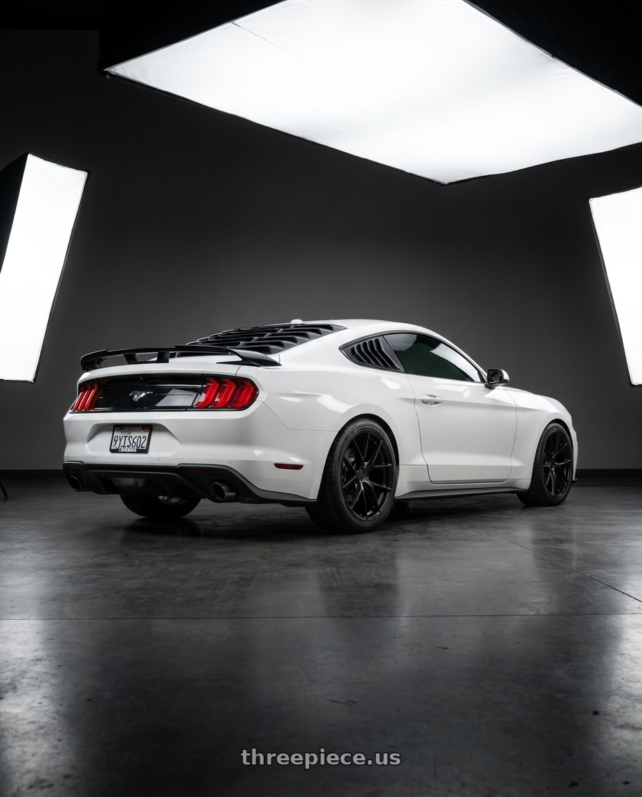 2018 Ford Mustang with Aodhan AFF7 5x114.3 19x9.5+35 Matte Black wheels rear three quarter view square tires