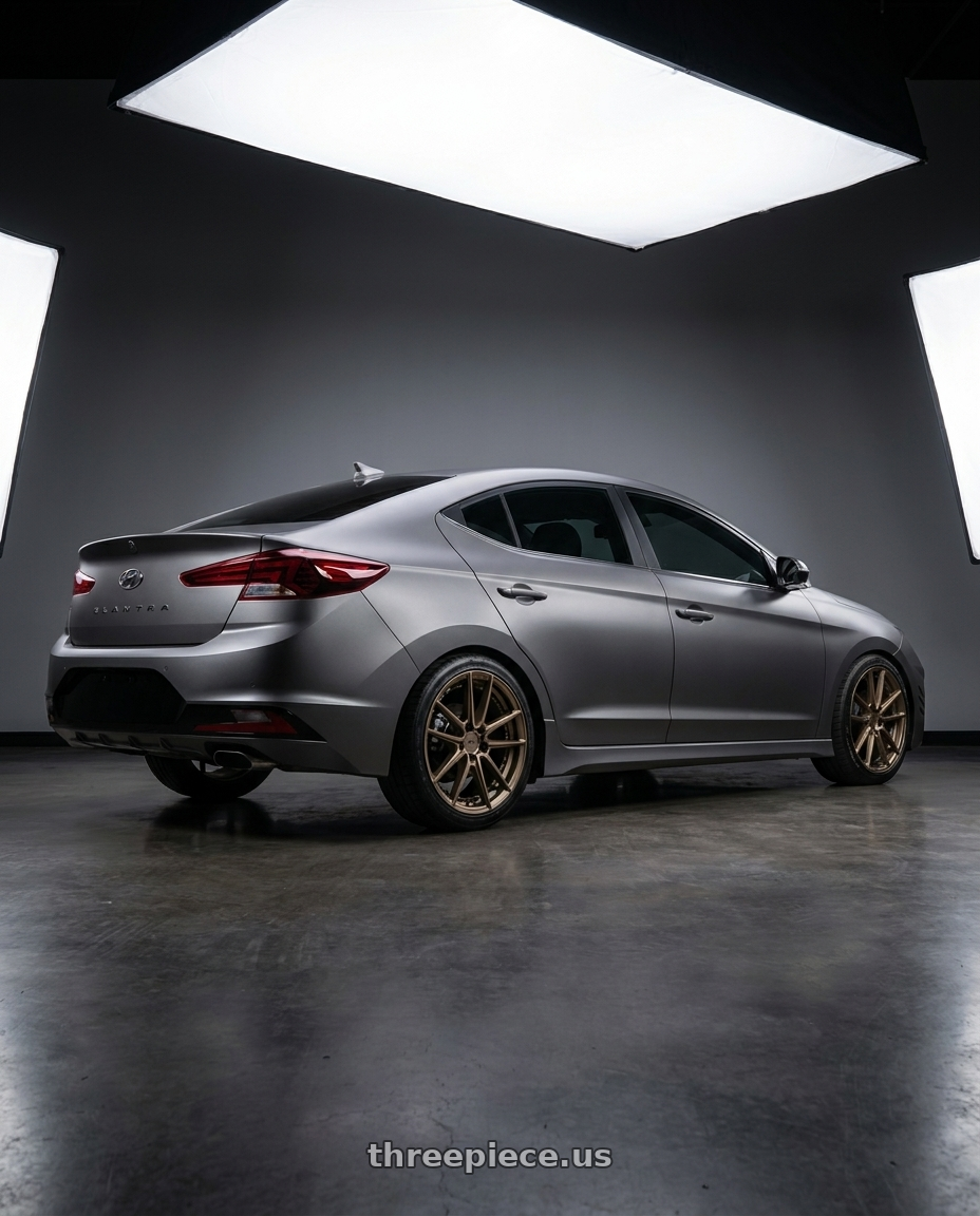 2020 elantra sport mk6.5 with Niche 1PC M222 DFS 5X114.3 18X8 +40 MATTE BRONZE wheels rear three quarter view square tires