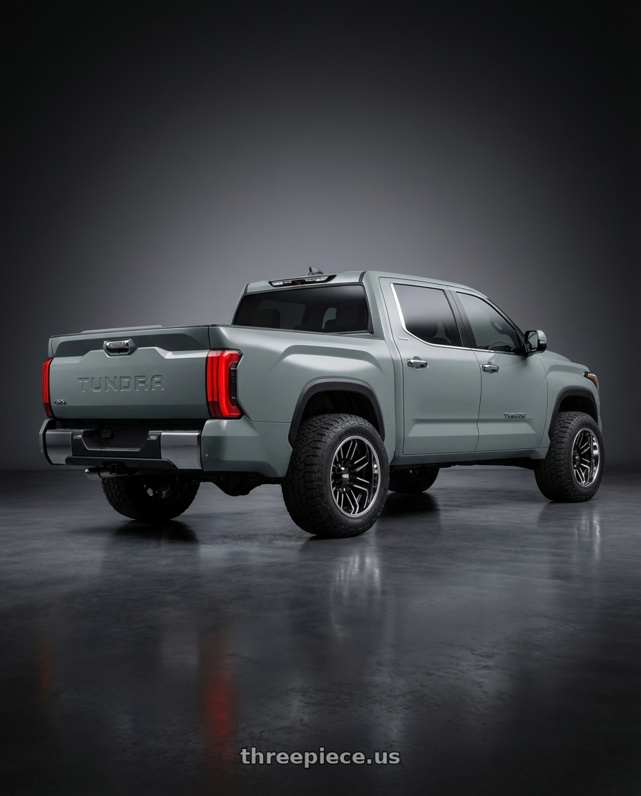 2024 Toyota Tundra with Moto Metal MO202 6X139.7 20X12 -44 GLOSS BLACK MACHINED CENTER CHROME LIP wheels rear three quarter view meaty tires