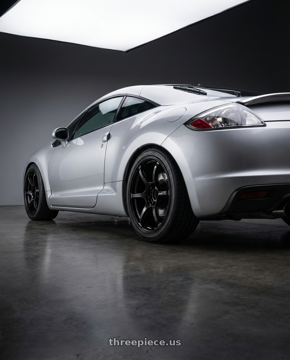 2010 Mitsubishi Eclipse with Advan RGIII 5x114.3 18x8.5+31 Gloss Black wheels rear three quarter view square tires
