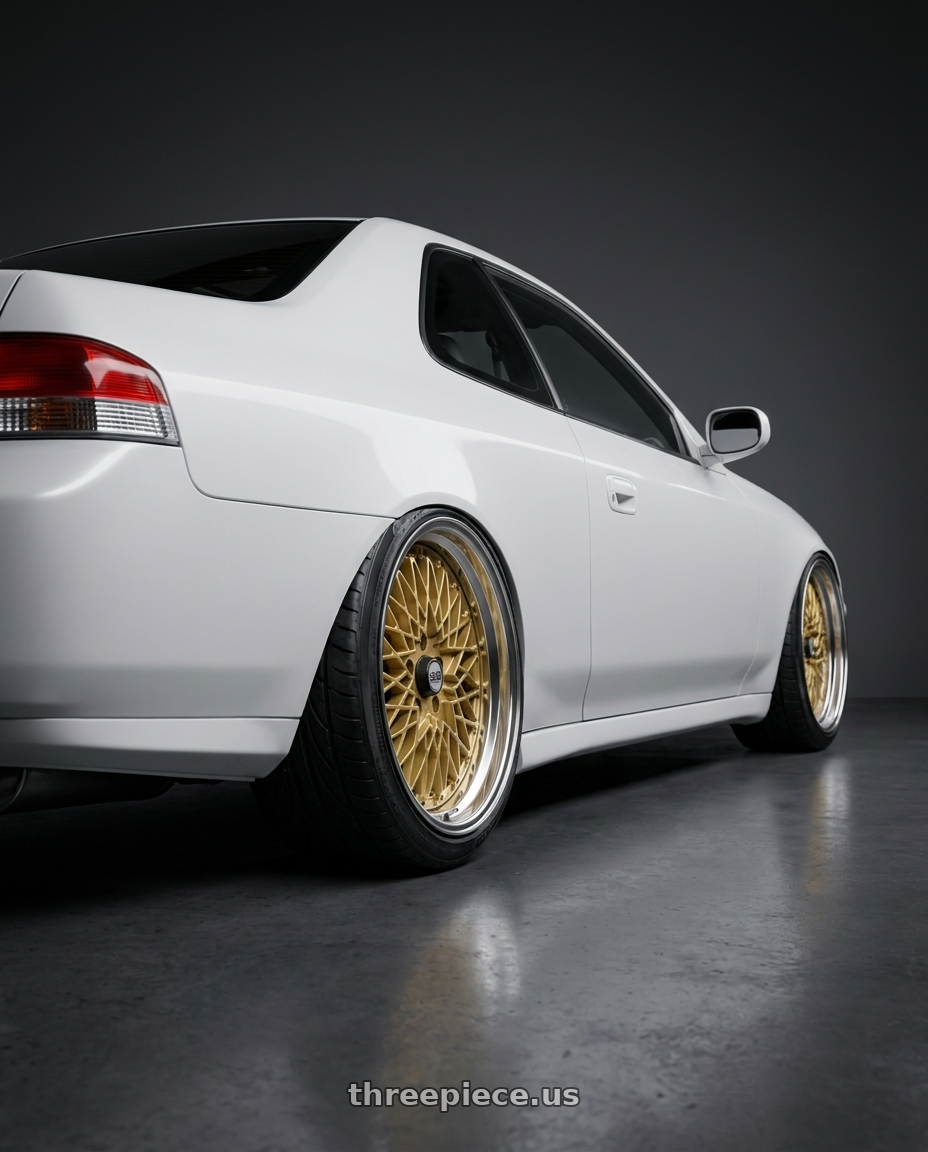 2000 Honda Prelude with SSR Formula MESH 5x114.3 19X9.5+25 HP Disk Fm Gold wheels rear three quarter view extreme stretch tires
