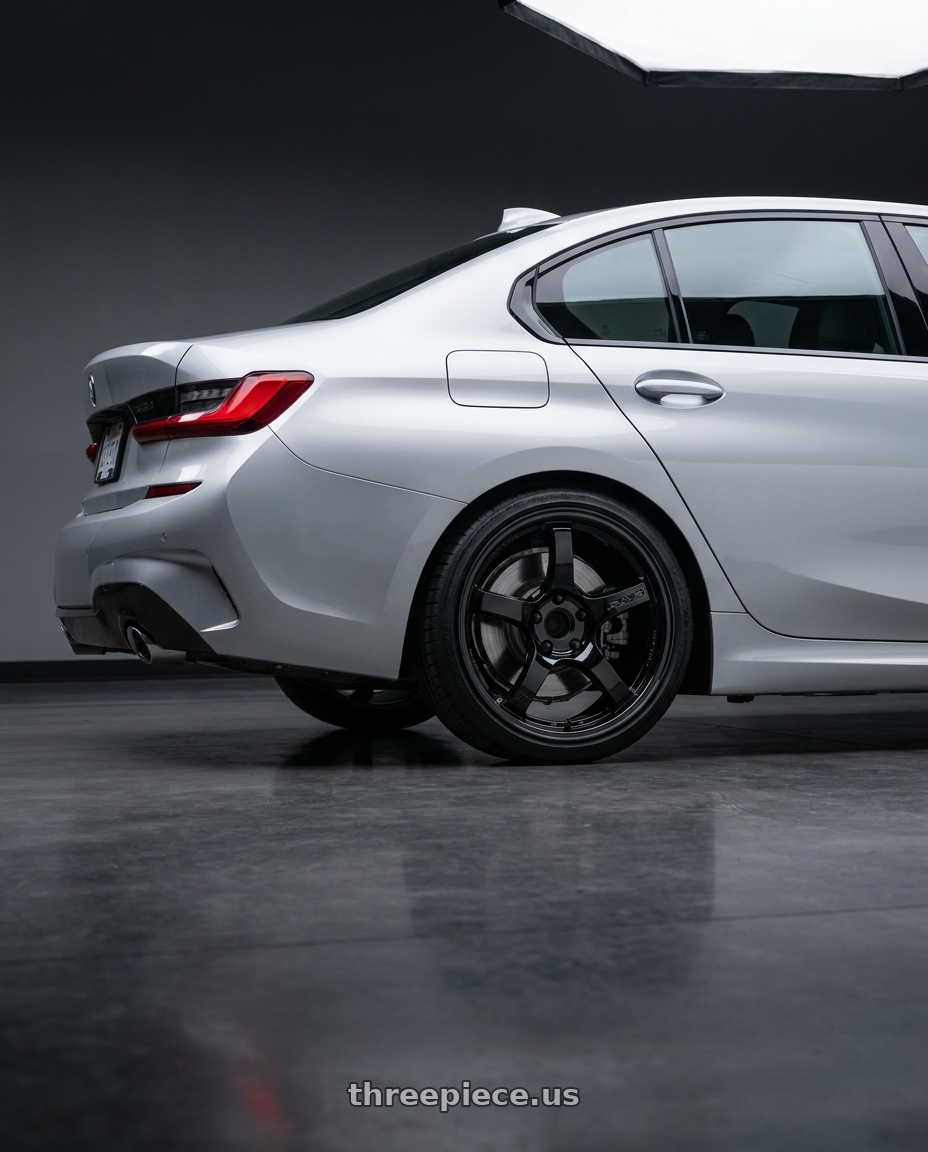 2023 BMW 3 Series G20 with Gram Lights 57CR 5x112 19x10.5+22 Glossy Black wheels rear three quarter view square tires