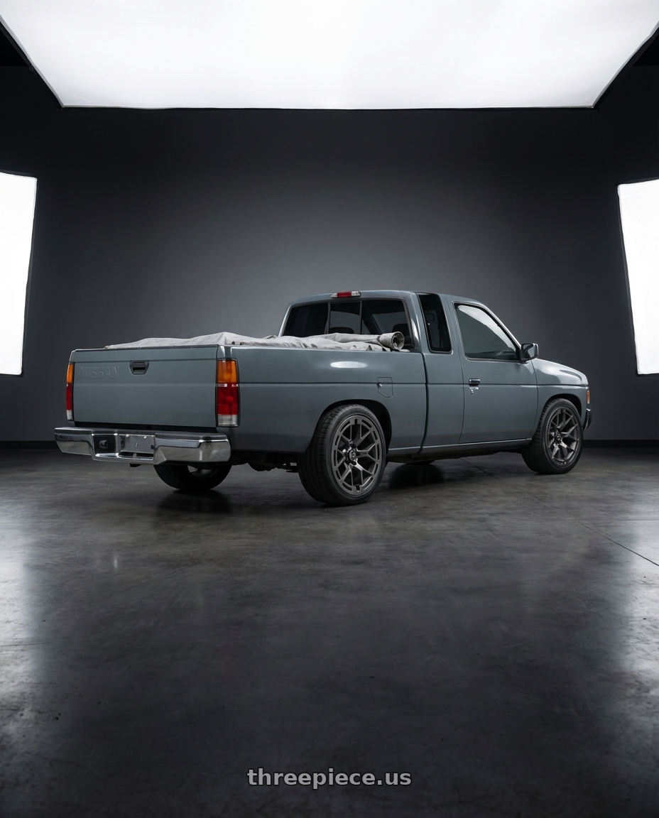 1994 Nissan d21 xe grey with RTR 950SC Tech 6 Ranger/Bronco 6x139.7 17x9 +30 Satin Charcoal wheels rear three quarter view square tires