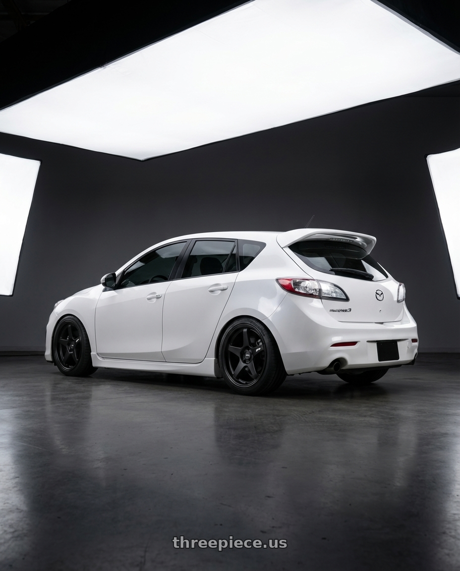 2012 Mazda Mazdaspeed3 with ESR Wheels APEX SERIES AP5 5x114.3 18x9.5 +22 Matte Black wheels rear three quarter view square tires