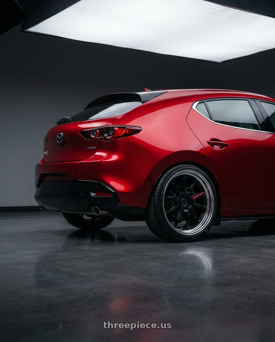 2025 Mazda 3 with Emotion ZR10 2P wheels rear three quarter view square tires