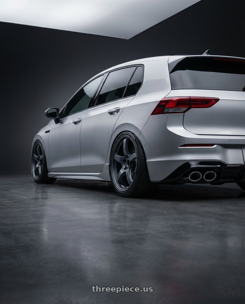 2024 Volkswagen Golf R MK8 with Gram Lights 57CR 5x112 19x9.5+45 Gunblue II wheels rear three quarter view slight stretch tires