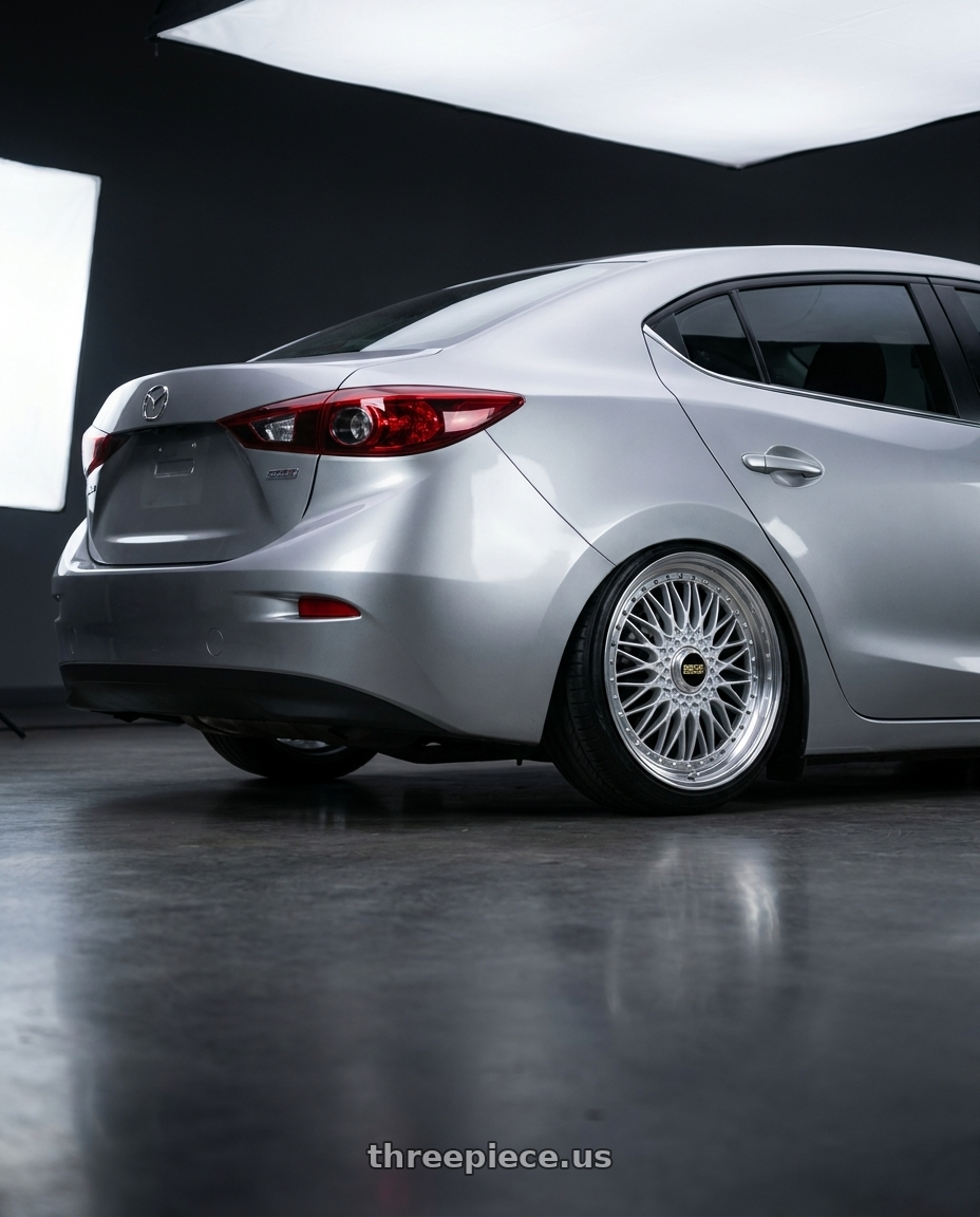 2015 Mazda 3  with BBS Super-RS 5x112 19x9.0+42 Silver wheels rear three quarter view slight stretch tires
