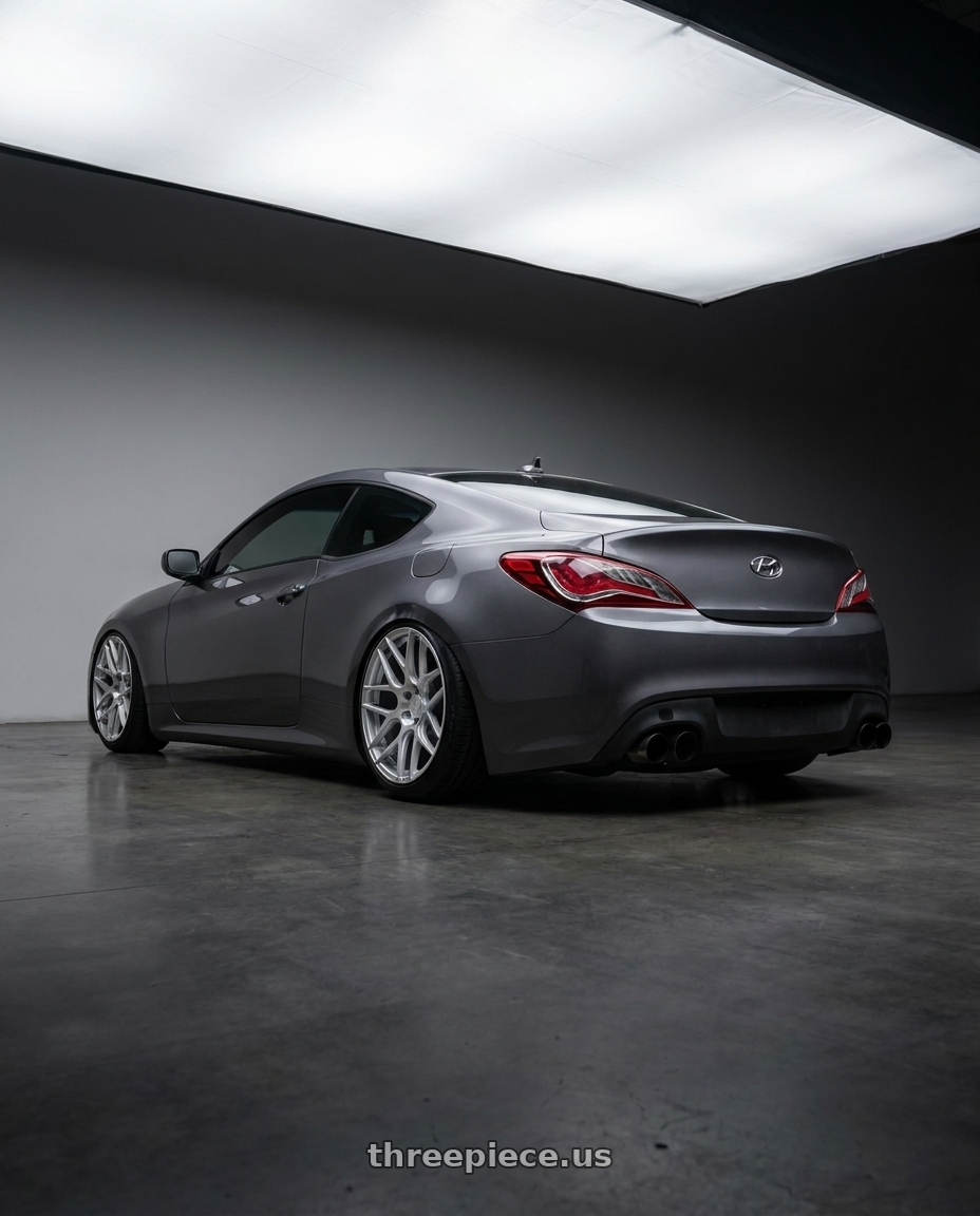 2014 Hyundai Genesis Coupe with Aodhan AFF2 5x114.3 19x8.5+35 Gloss Silver Machined Face wheels rear three quarter view slight stretch tires
