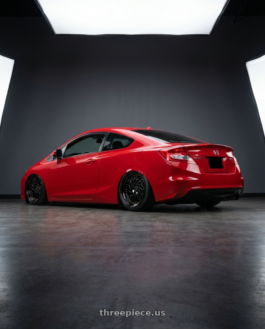 2011 Honda Civic Si with Aodhan DS03 5x114.3 18x9.5 +30 Black Vacuum w/ Gold Rivets wheels rear three quarter view slight stretch tires