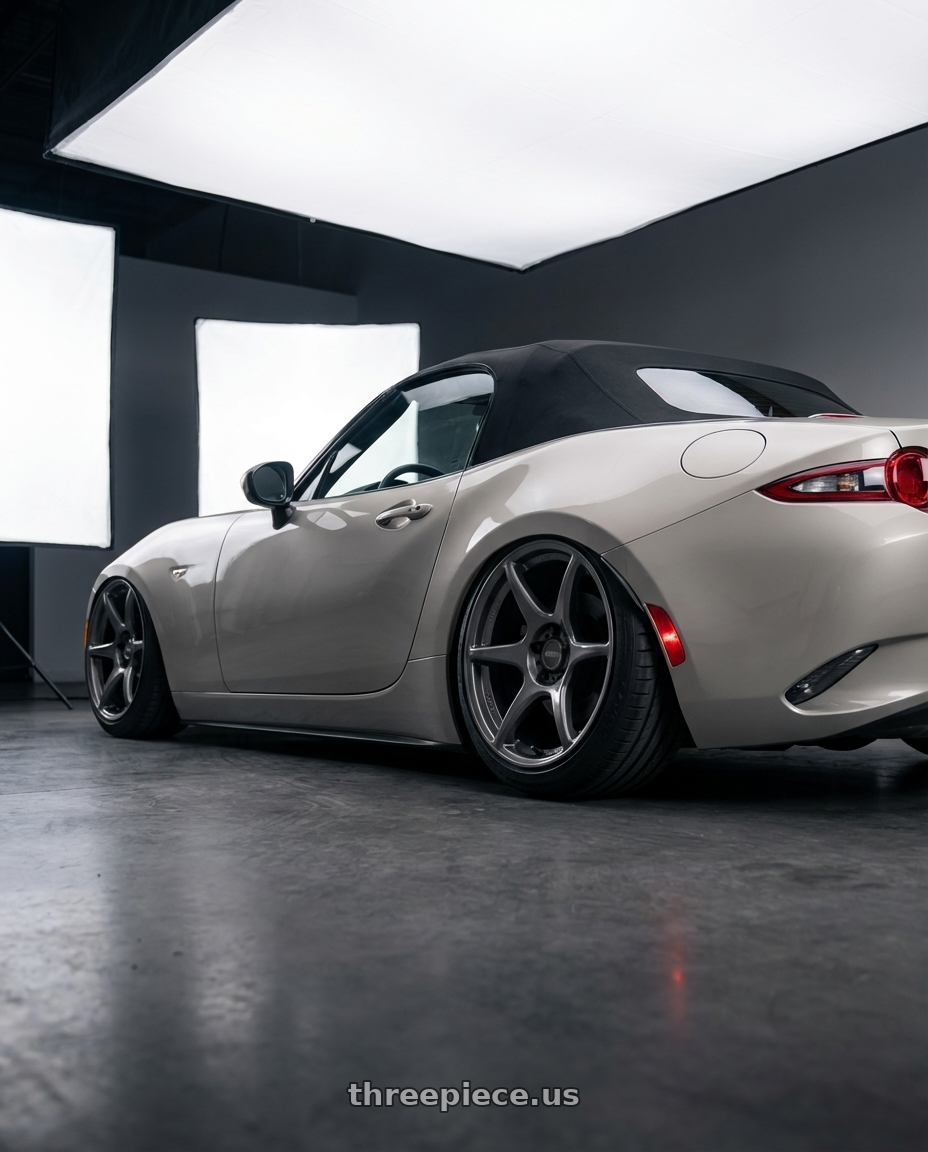 2021 Mazda MX-5 Miata ND with Kansei K11G Tandem 5x114.3 17x9 22 Gunmetal wheels rear three quarter view slight stretch tires