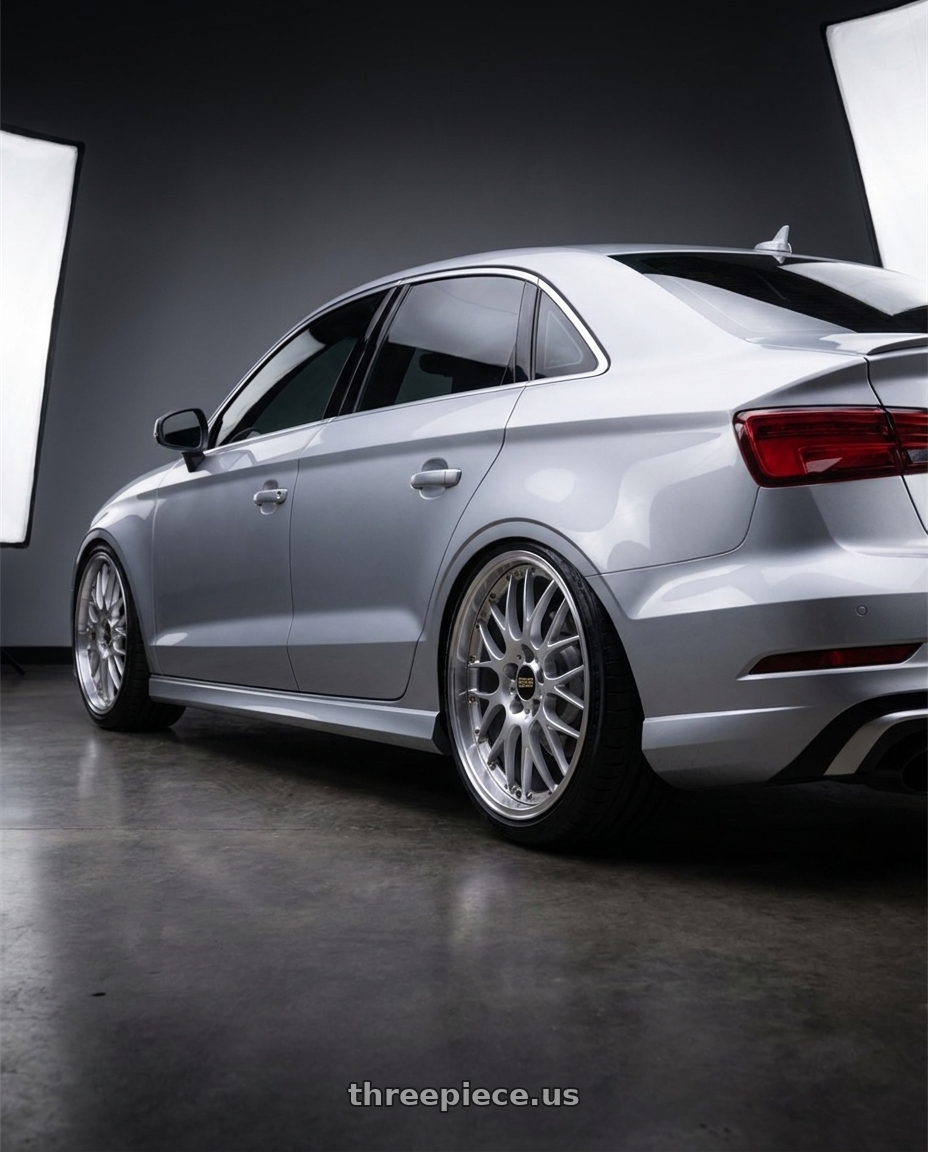 2017 Audi RS3 with BBS RS-GT 5x112 20x10.0+22 Diamond Silver wheels rear three quarter view extreme stretch tires