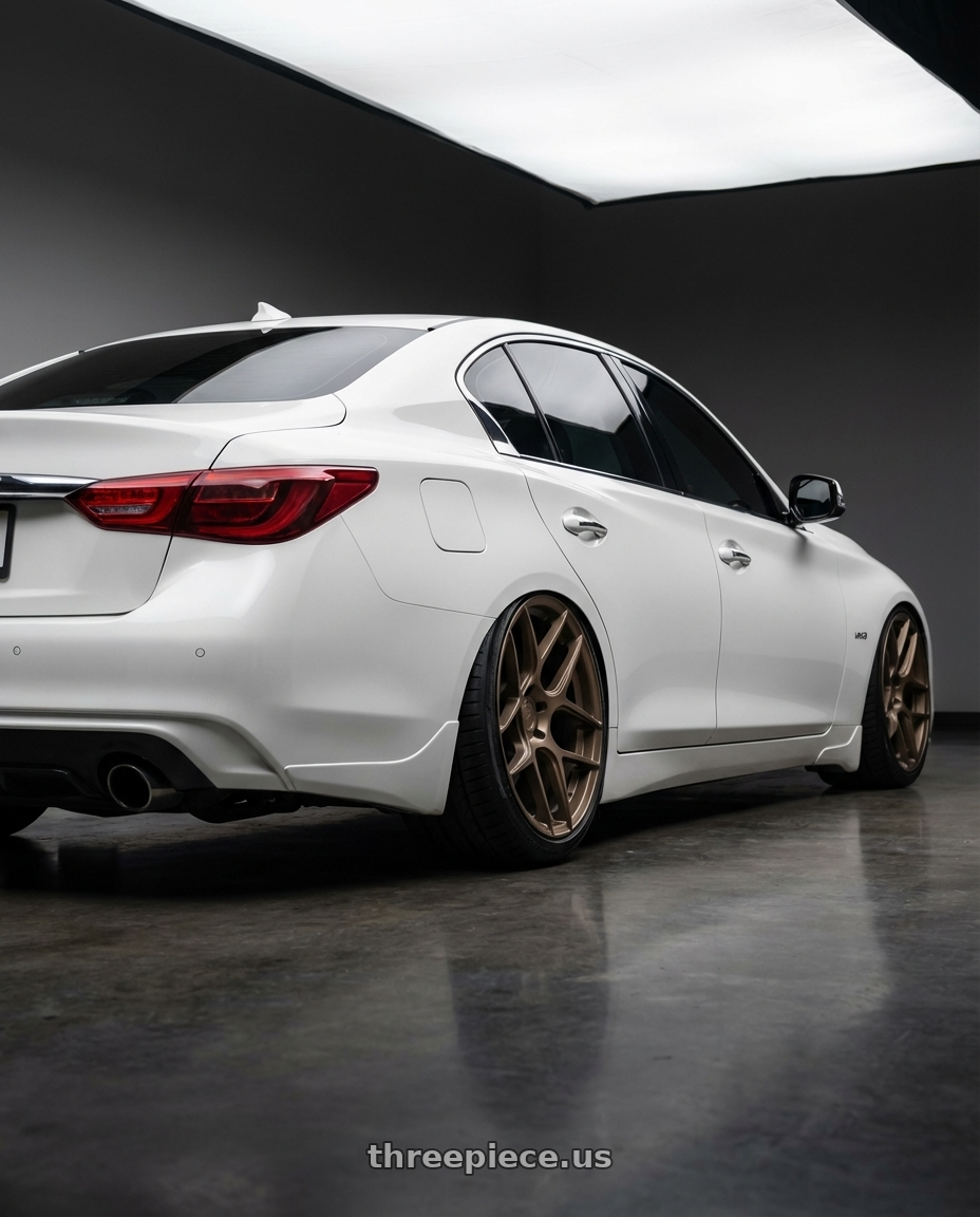 2020 Infiniti Q50 with Aodhan AFF2 5x114.3 20x9+32 Matte Bronze wheels rear three quarter view slight stretch tires