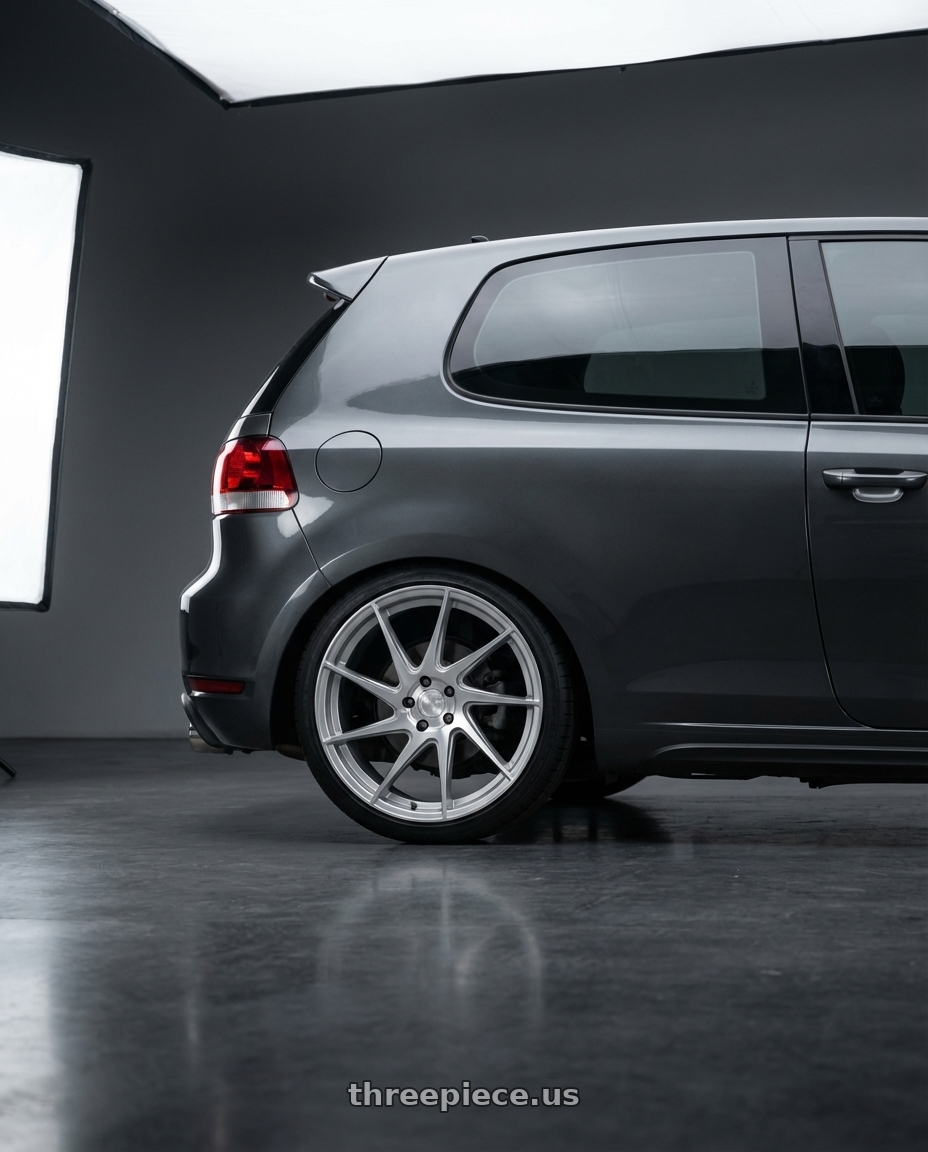 2013 Volkswagen GTI MK6 with Aodhan AH09 5x112 18x8.5 +35 Gloss Silver Machined Face wheels rear three quarter view square tires