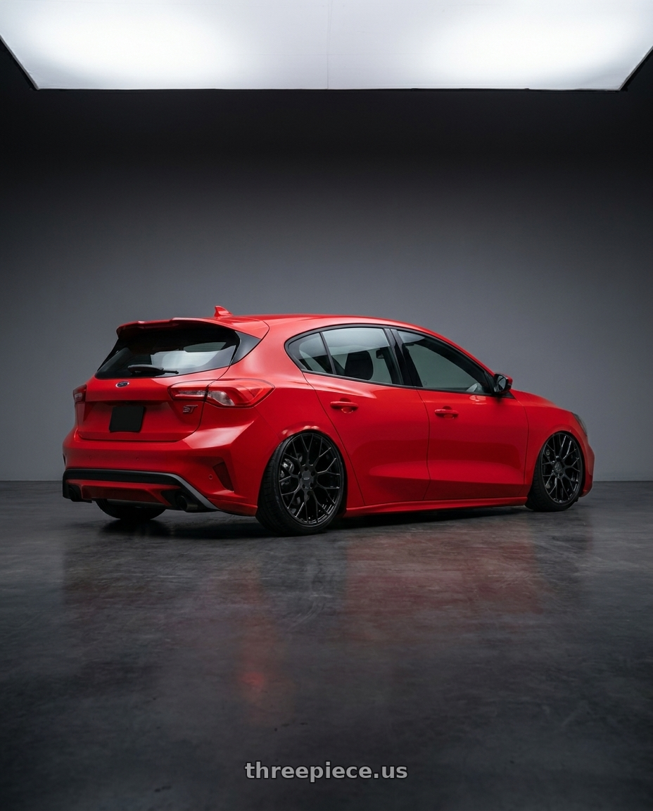 2020 Ford focus st red with Petrol P2B 4X100 16X7 +40 GLOSS BLACK wheels rear three quarter view slight stretch tires