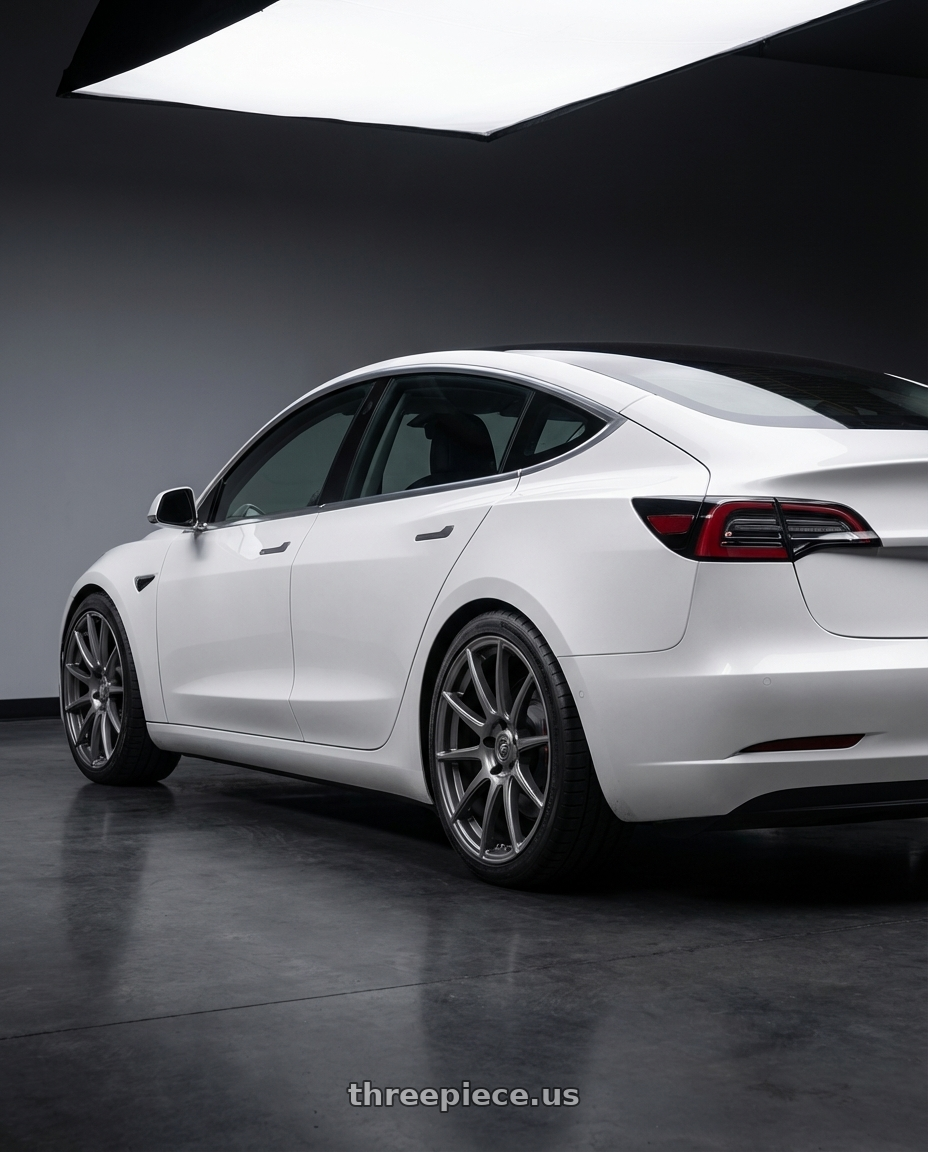 2023 Tesla Model 3 with Forgestar CF10 5x114.3 19x9 +35 Gloss Anthracite wheels rear three quarter view square tires