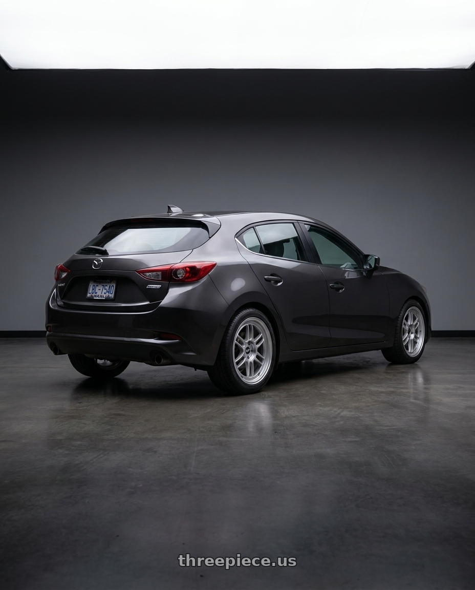 2017 Mazda Mazda3 Grand Touring with Enkei RPF1 5x114.3 17x8.5+30 Silver wheels rear three quarter view square tires