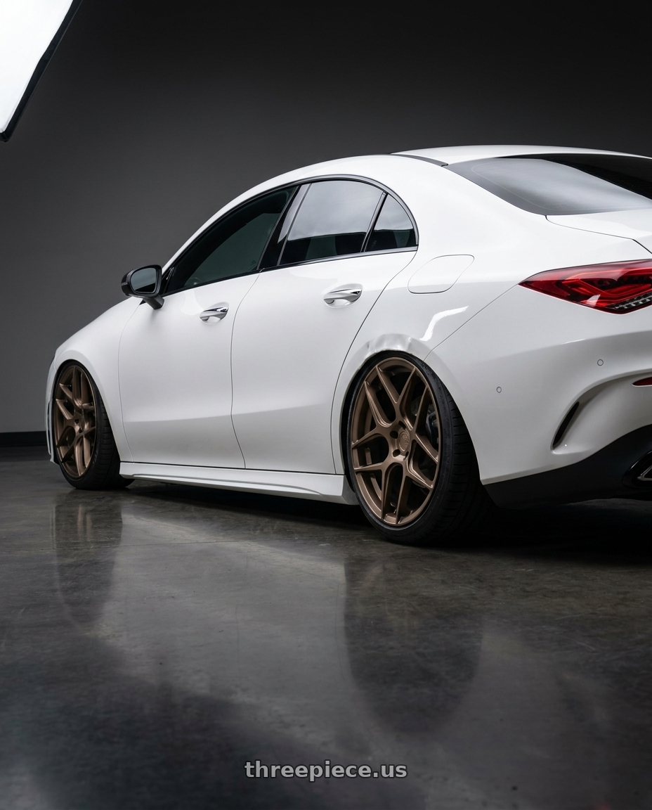 2023 Mercedes-Benz CLA C118 with Aodhan AFF2 5x112 19x8.5+35 Matte Bronze wheels rear three quarter view slight stretch tires