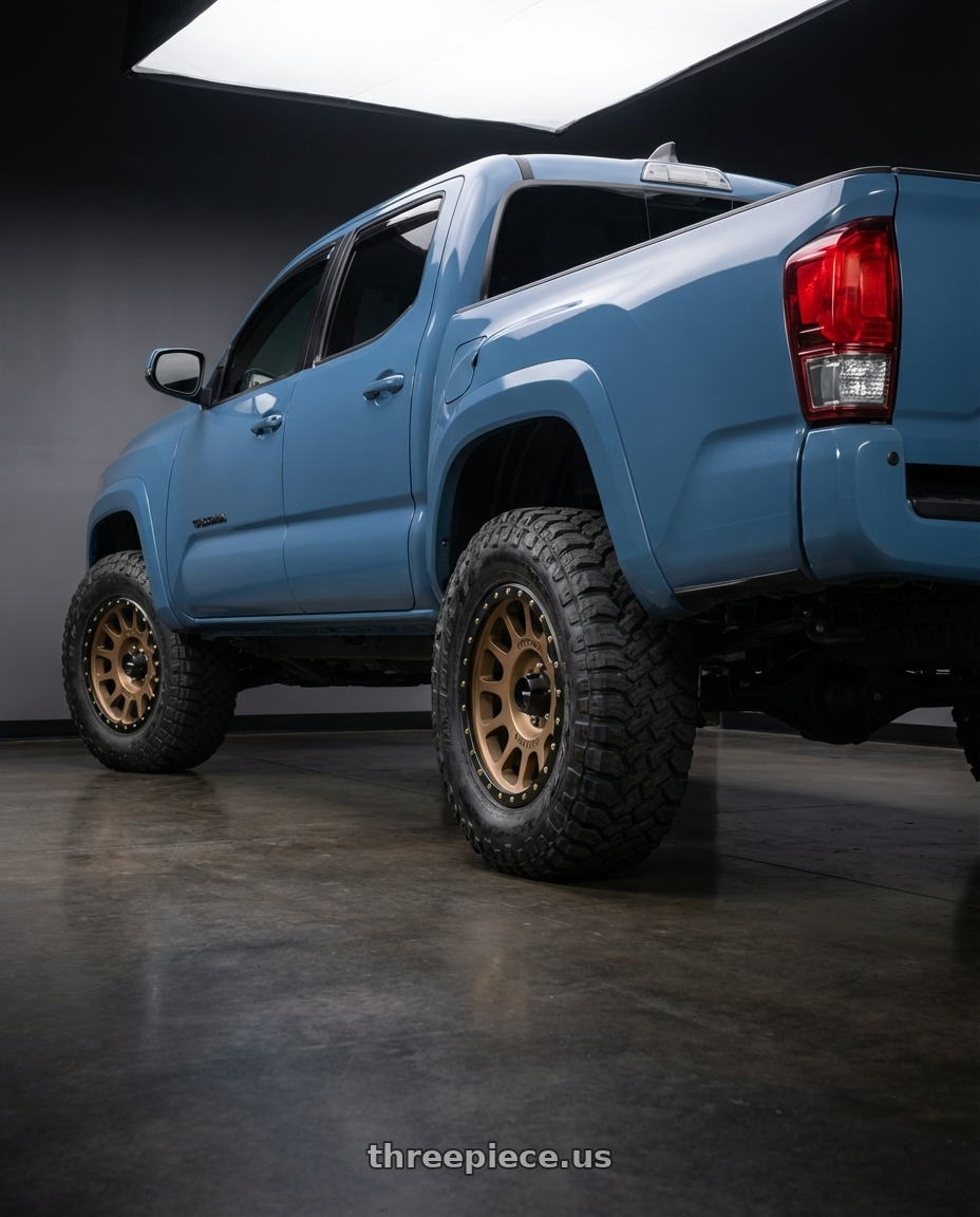 2019 Toyota Tacoma with Method Race Wheels 305BZ NV 6x139.7 18x9 -12 METHOD BRONZE wheels rear three quarter view meaty tires