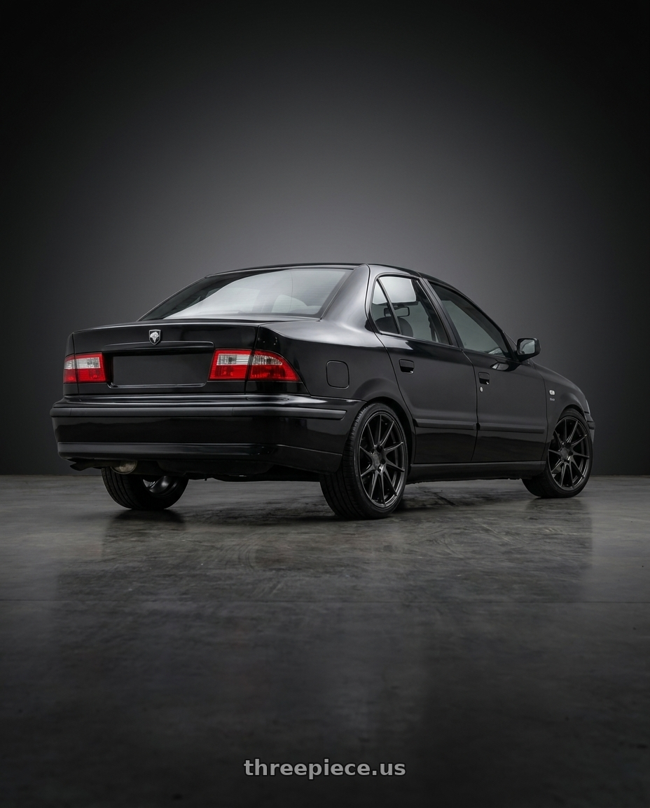 2000 Peugeot samand with Aodhan AH09 5x114.3 18x8.5 +35 Hyper Black wheels rear three quarter view square tires