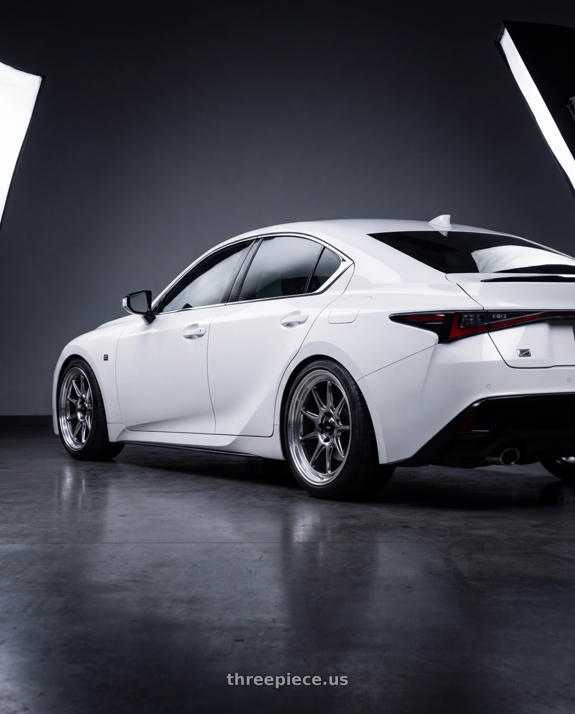 2024 Lexus IS 350 with Konig Countergram 5x114.3 19x10+25 Hyper Chrome / Machined Lip wheels rear three quarter view square tires