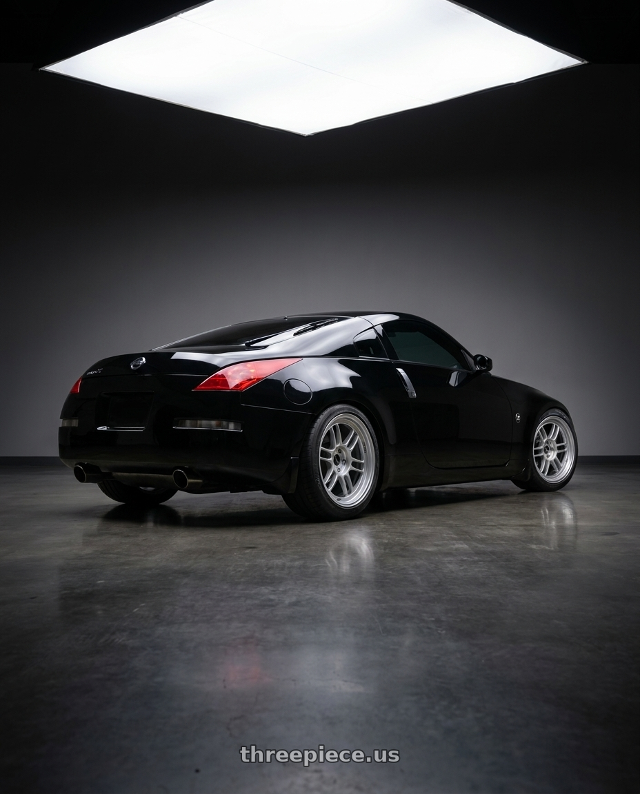 2006 Nissan 350Z super black with Enkei RPF1 5x114.3 18x8.5+30 Silver wheels rear three quarter view square tires