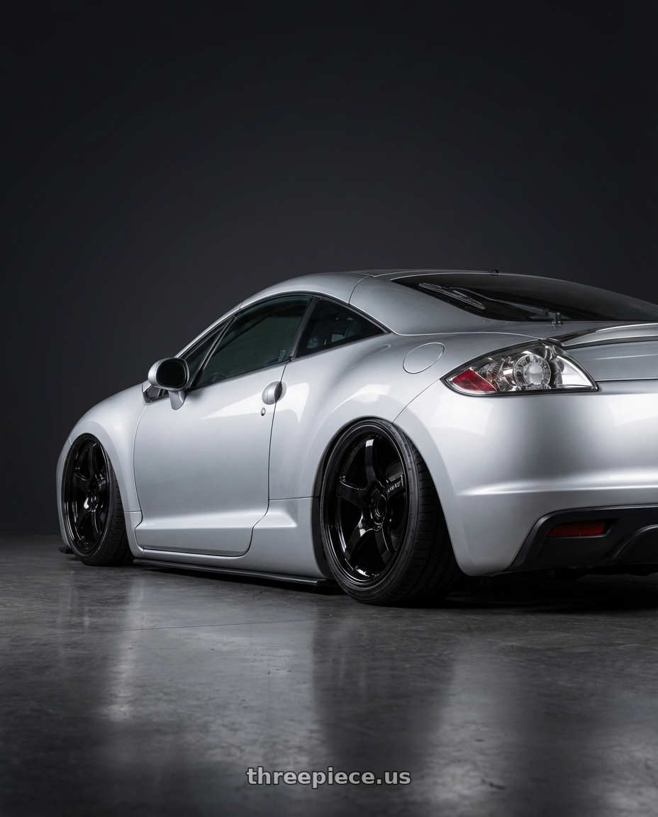 2010 Mitsubishi Eclipse with Gram Lights 57CR 5x114.3 19x9.5+45 Glossy Black wheels rear three quarter view slight stretch tires