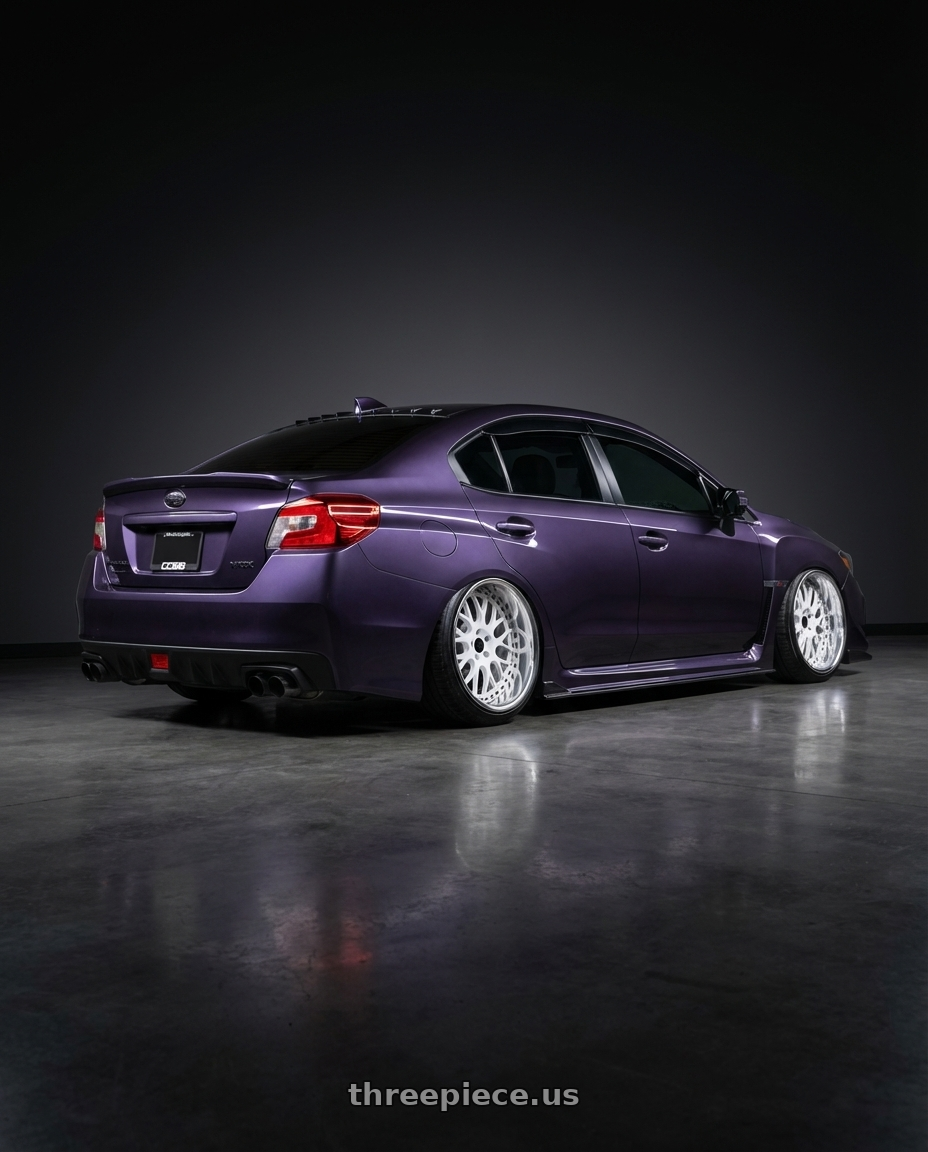 2017 Subaru wrx with Heritage Wheel OKAYAMA wheels rear three quarter view slight stretch tires