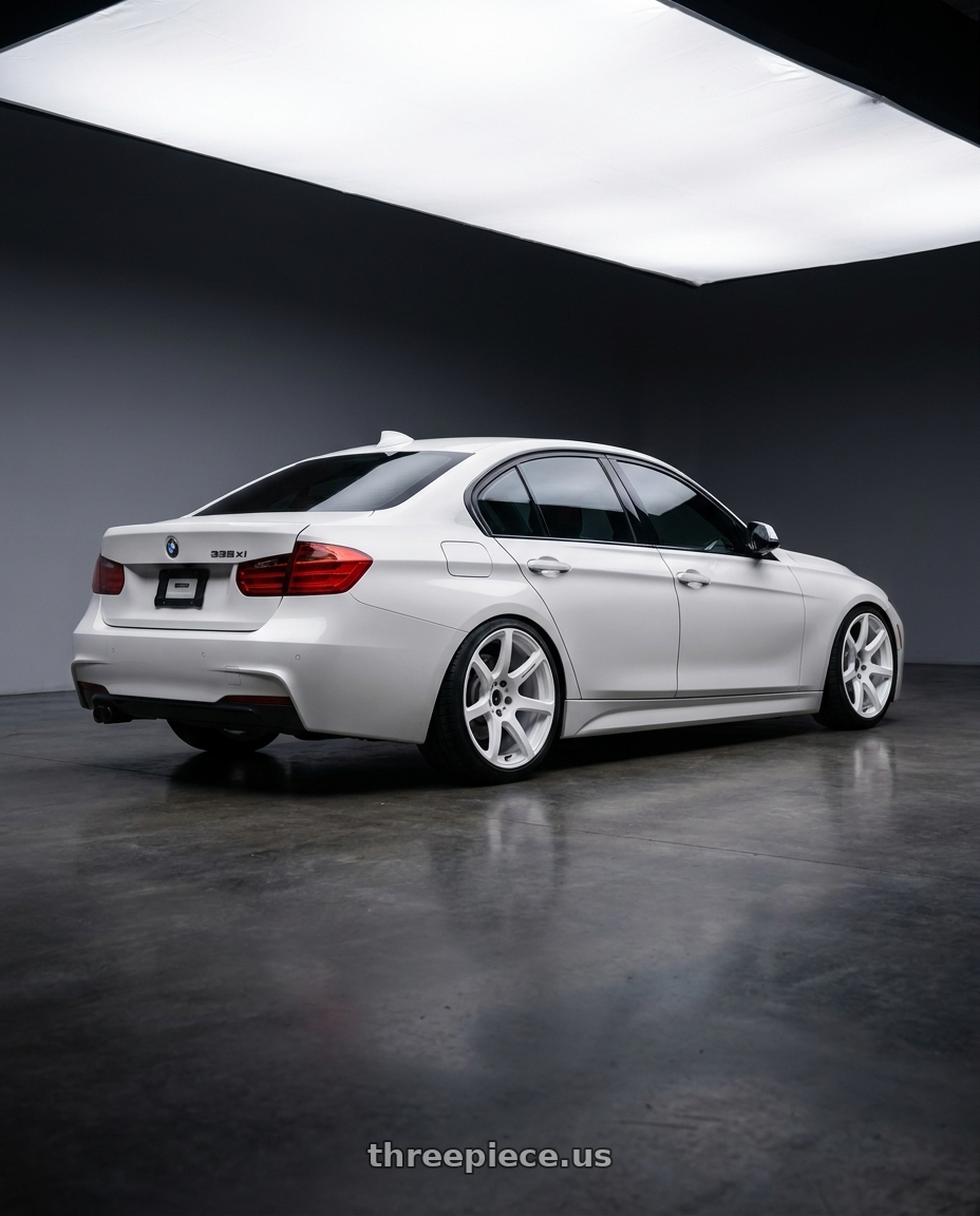 2013 bmw 335xi alpine white with Work Emotion T7R wheels rear three quarter view slight stretch tires