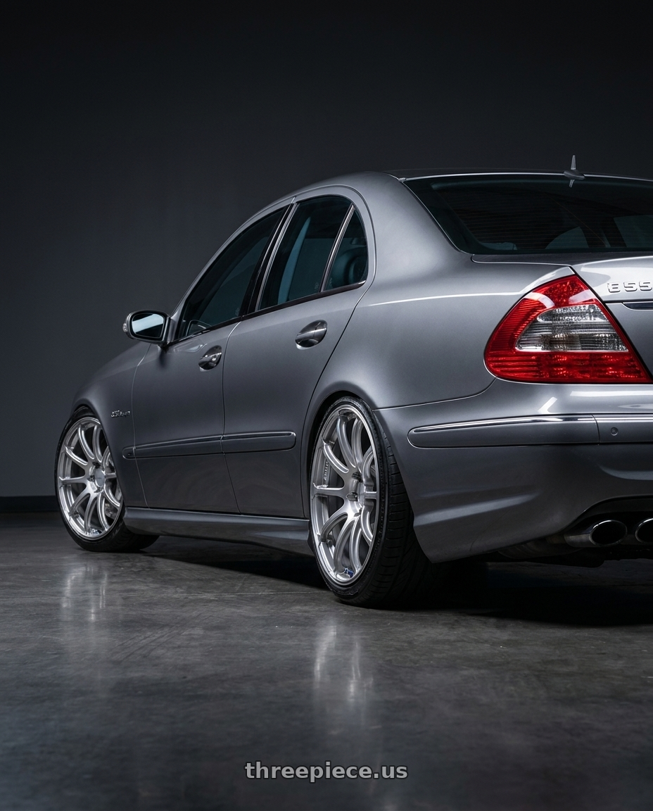 2006 Mercedes E55 AMG with Advan Racing RSII 5x130 20x10.0 +40 HYPER SILVER wheels rear three quarter view extreme stretch tires
