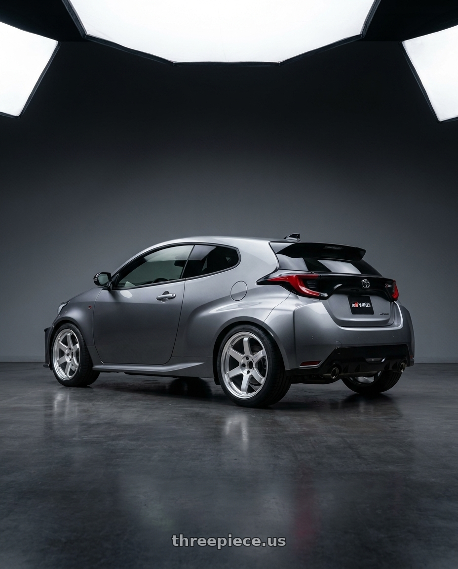 2025 Toyota GR YARIS gen 2 with volk racing te37 with Volk Racing TE37 ULTRA M-SPEC 5x114.3 19x9.5 +22 DIAMOND SILVER wheels rear three quarter view square tires
