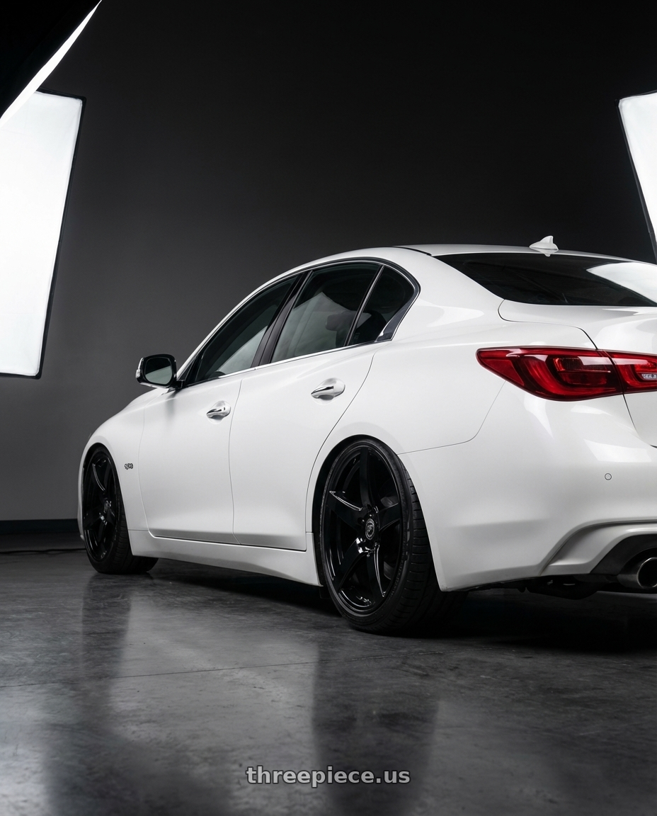 2020 Infiniti Q50 with Forgestar CF5 5x114.3 20x9.5 +29 Gloss Black wheels rear three quarter view slight stretch tires