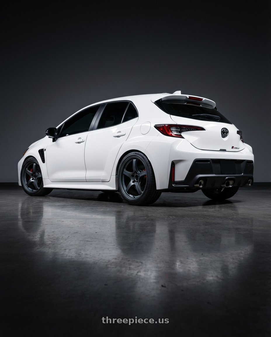 2024 Toyota GR Corolla with Gram Lights 57CR 5x114.3 17x9+38 Gunblue II wheels rear three quarter view square tires