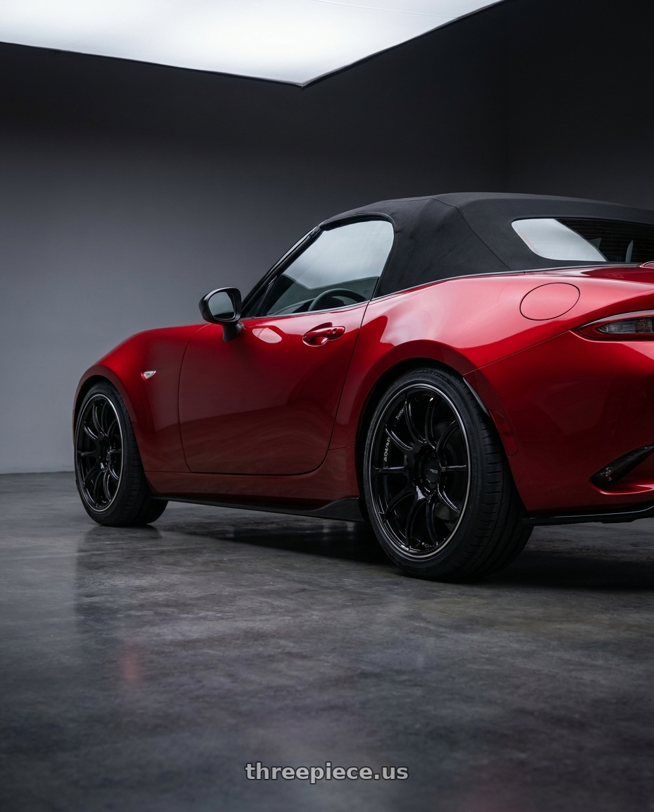 2024 mazda mx5 with Advan Racing RZII 4x100 17x7.5 +38 RACING GLOSS BLACK & RING wheels rear three quarter view square tires