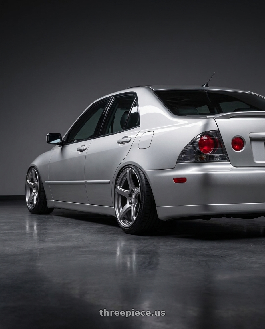 2004 lexus is300 with Work Emotion T5r 5x114.3 17x8 +45 Glow Silver wheels rear three quarter view slight stretch tires