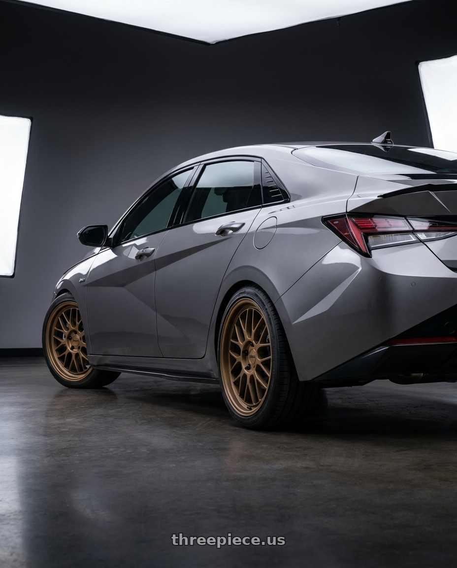 2023 Hyundai Elantra n line with KATANA RACING KR06 5x114.3 18x8 +40 Matte Bronze wheels rear three quarter view square tires