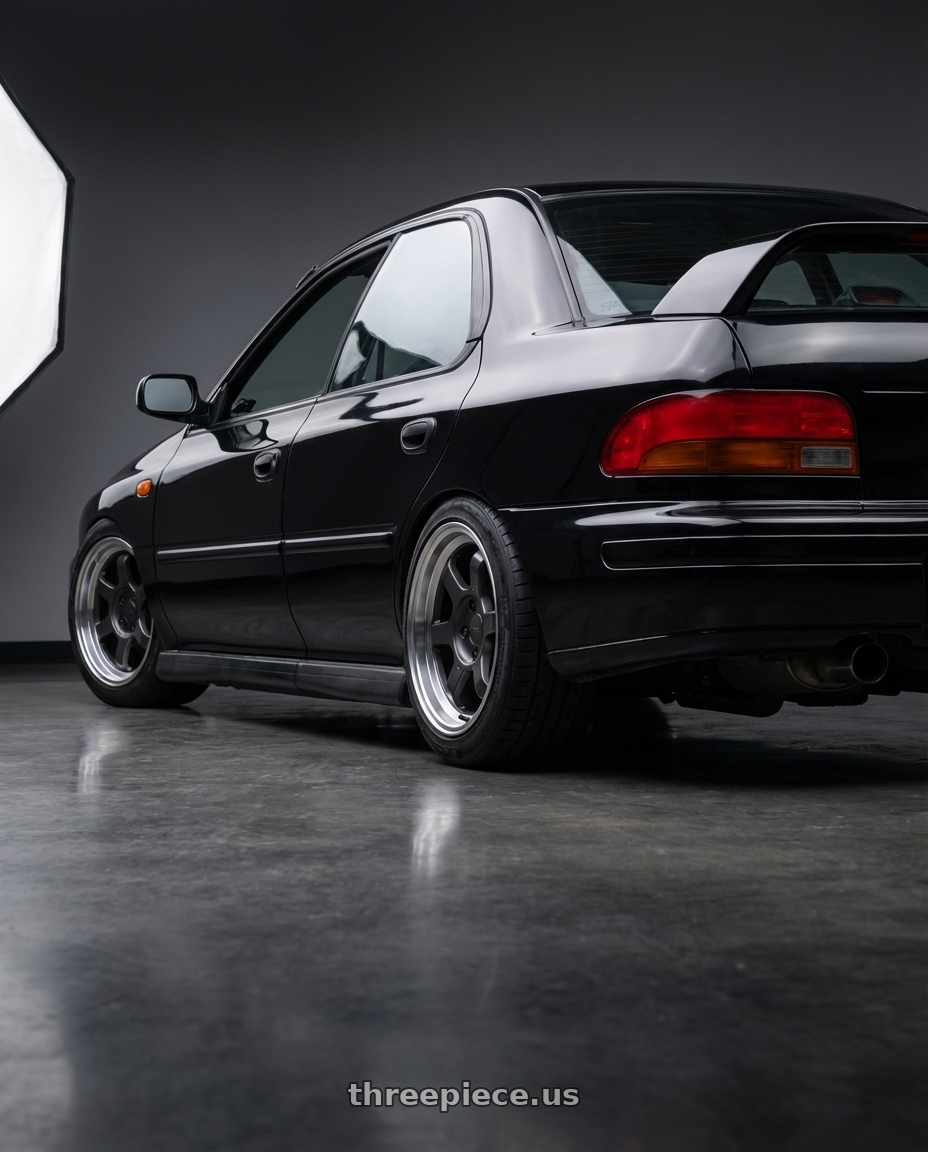 1998 Subaru Impreza GC8 with 9six9 SIX-1 Deep 4x100 15X8 +20 Carbon Gray / Machined Lip wheels rear three quarter view square tires