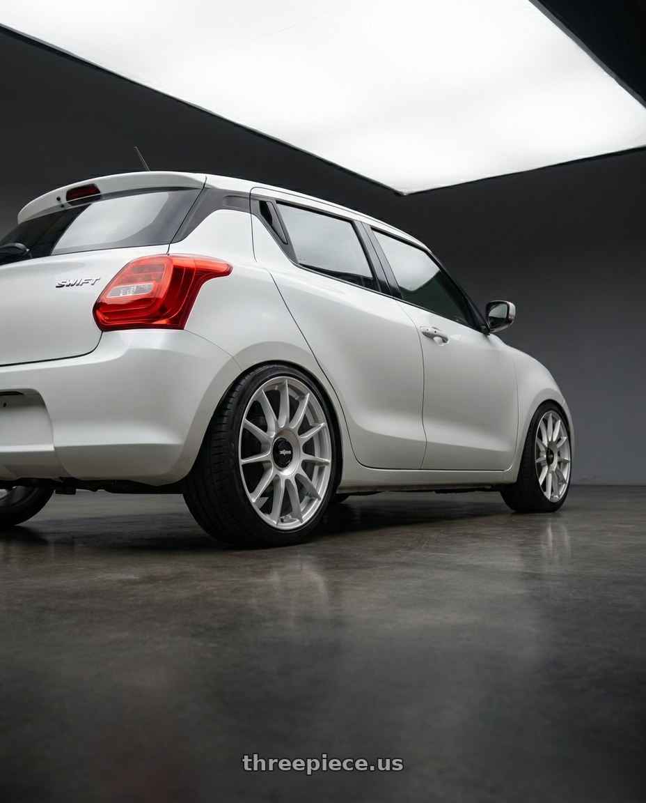 2024 Suzuki swift  with Rotiform 1PC R170 DTM 5X108/5X114.3 17X8 +40 SILVER wheels rear three quarter view square tires