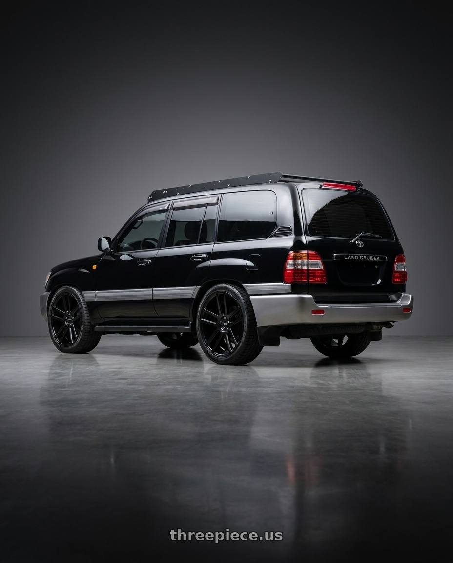2001 toyota land cruiser black with Niche 1PC M097 ELAN 6X139.7 24X10 +30 GLOSS BLACK wheels rear three quarter view square tires