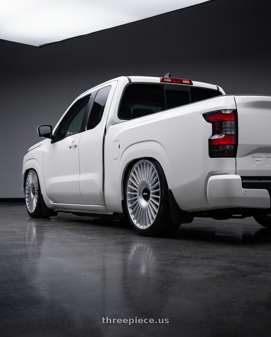 2025 nissan frontier king cab with Rotiform RC202 GRZ 5X112/5X120 22x10 +20 GLOSS SILVER wheels rear three quarter view slight stretch tires