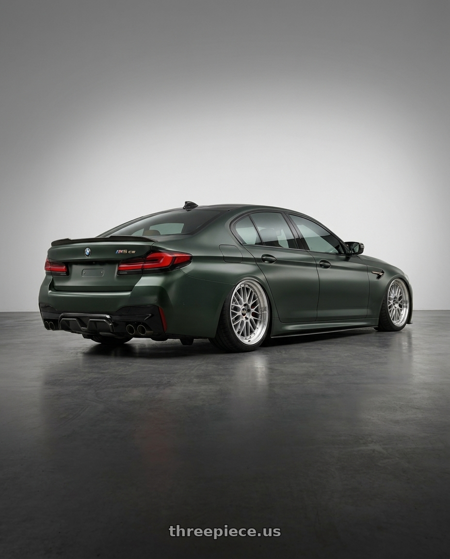 2022 Bmw m5 cs with BBS LM 5x114.3 17x7.5+38 Diamond Silver wheels rear three quarter view slight stretch tires