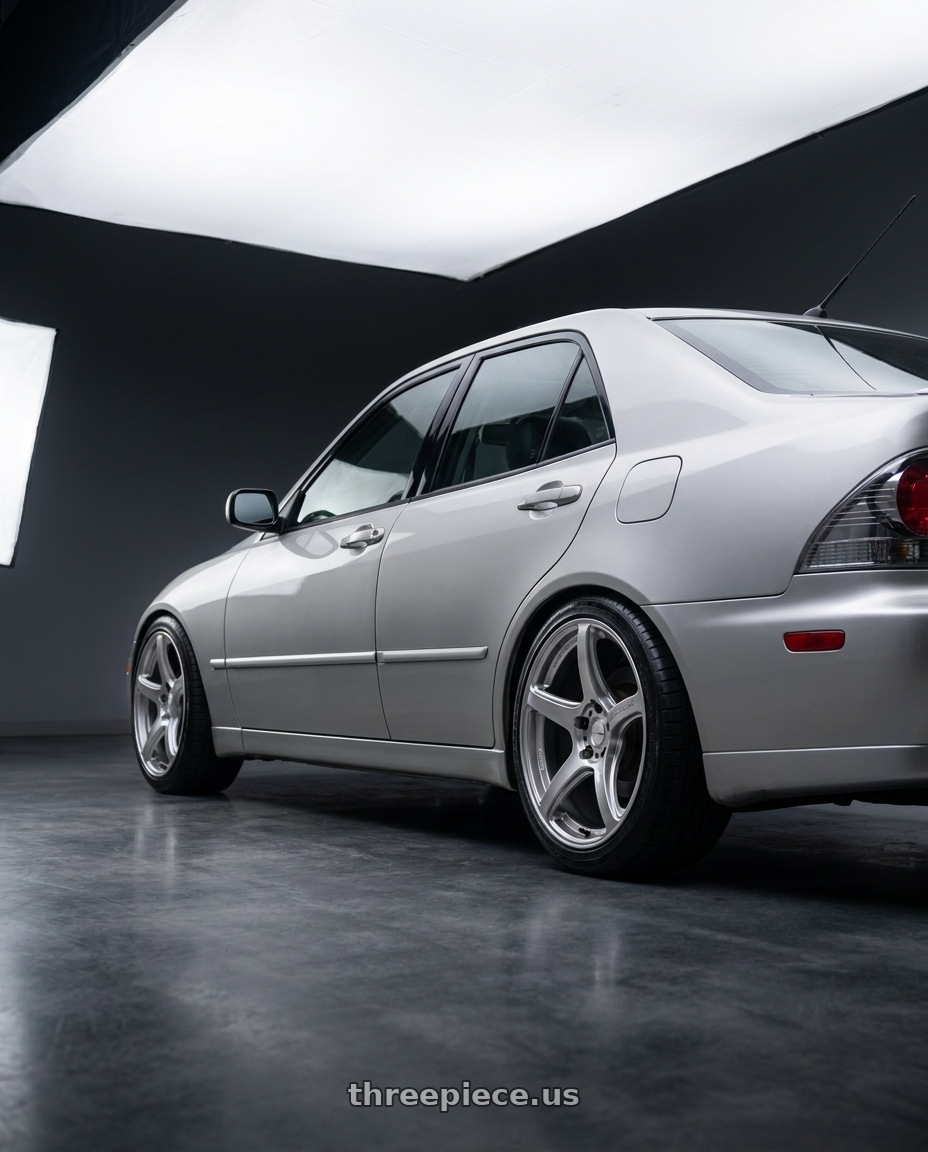 2003 Lexus is300 with Work Emotion T5r 5x114.3 17x8 +35 Glow Silver wheels rear three quarter view square tires